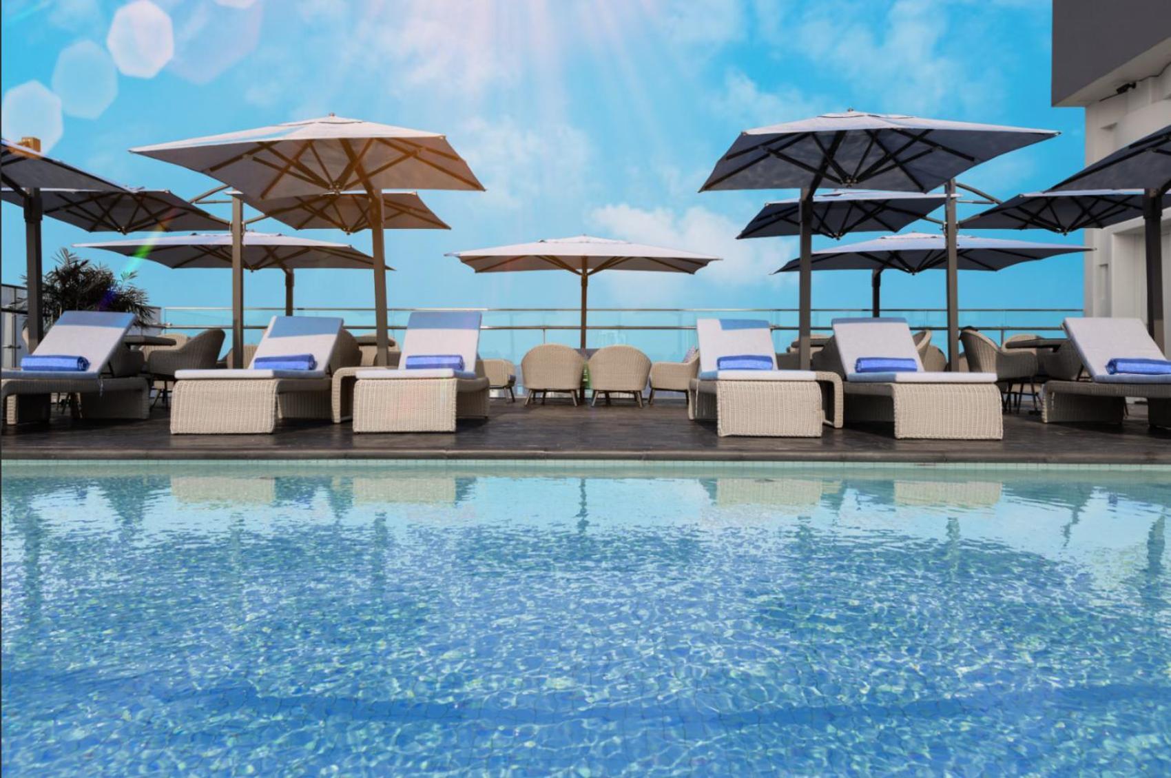 Wink Icon Hotel Danang Riverside - Luxury Suites - 24Hrs Stay & Rooftop Pool Bar Экстерьер фото